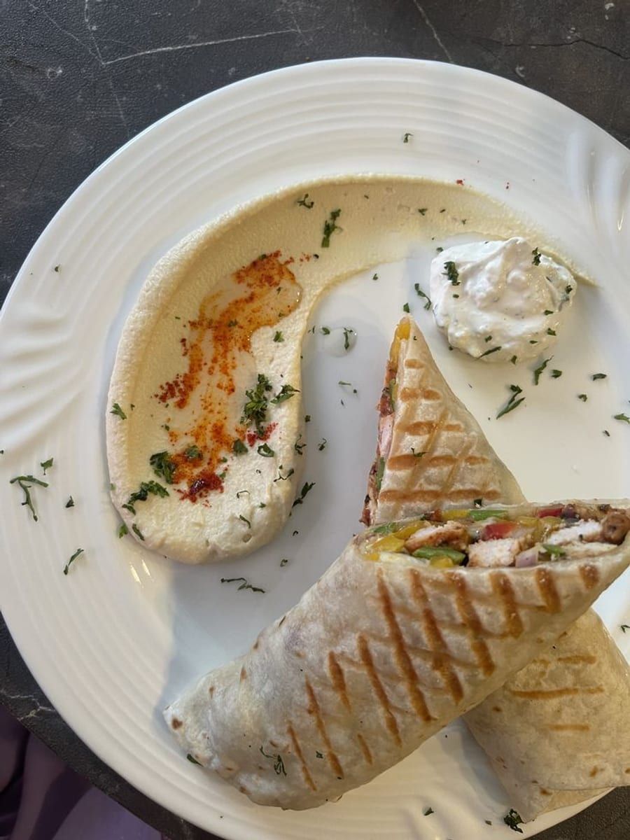 Grilled Chicken Pepper Wrap with Hummus and Garlic Yogurt, a recipe from Bloomplate 500